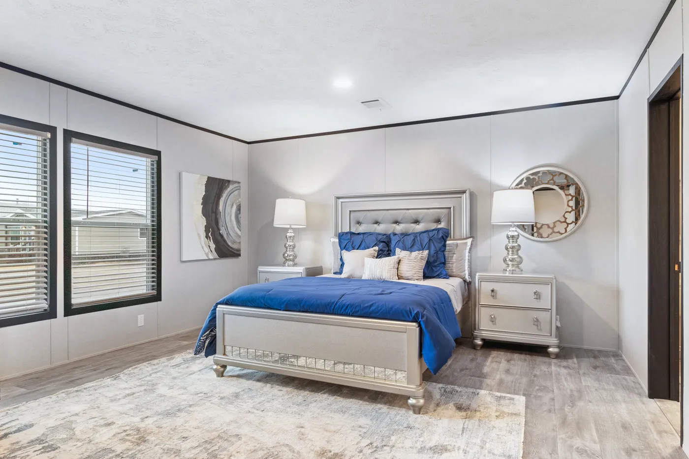 The HERCULES Primary Bedroom. This Manufactured Mobile Home features 4 bedrooms and 2 baths.