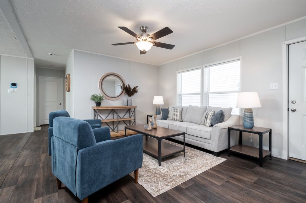 The THE EAGLE 48 Living Room. This Manufactured Mobile Home features 3 bedrooms and 2 baths.
