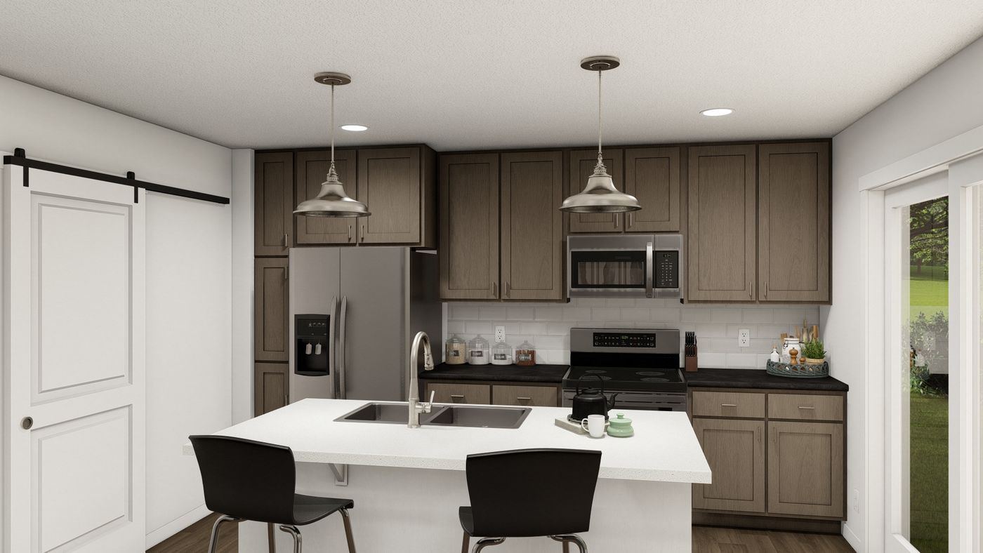 The THE WASHINGTON Kitchen. This Manufactured Mobile Home features 3 bedrooms and 2 baths.