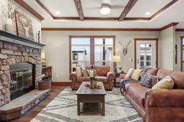 The THE DURANGO Living Room. This Manufactured Mobile Home features 3 bedrooms and 2 baths.