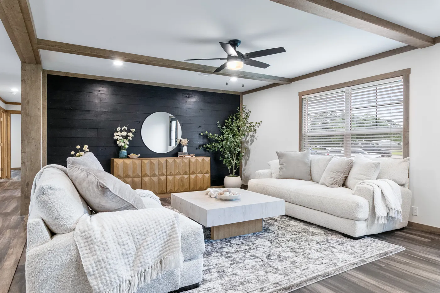 The EVERETT ELITE Living Room. This Manufactured Mobile Home features 4 bedrooms and 3 baths.