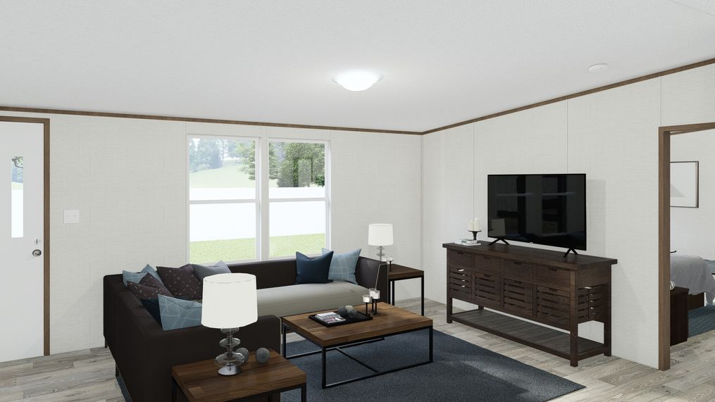 The EXCITEMENT Living Room. This Manufactured Mobile Home features 3 bedrooms and 2 baths.
