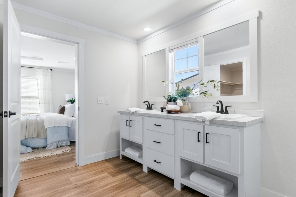 The FARM 4 FLEX ELITE Primary Bathroom. This Manufactured Mobile Home features 4 bedrooms and 3 baths.