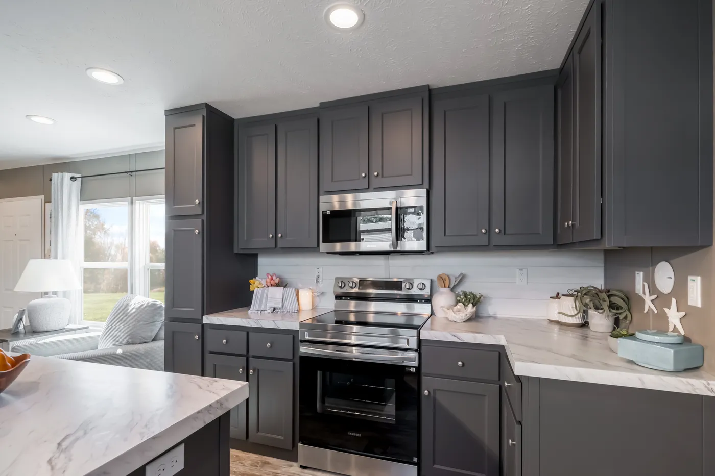 The THE DRIFTWOOD Kitchen. This Manufactured Mobile Home features 3 bedrooms and 2 baths.