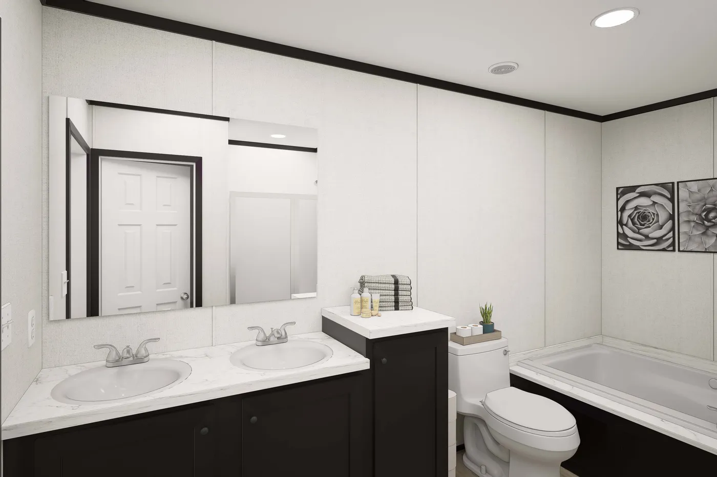 The PLATINUM ANNIVERSARY Primary Bathroom. This Manufactured Mobile Home features 3 bedrooms and 2 baths.
