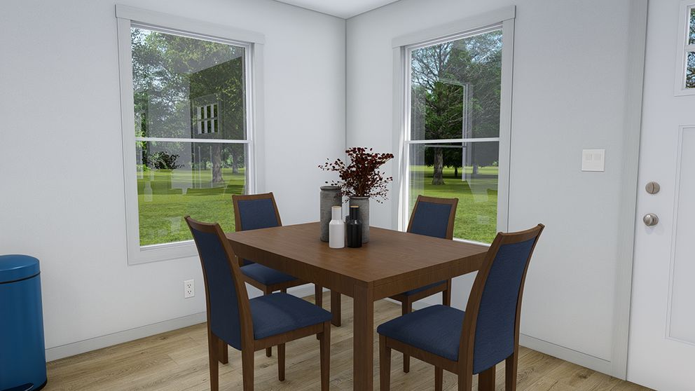 The RISING SUN Dining Room. This Manufactured Mobile Home features 2 bedrooms and 2 baths.