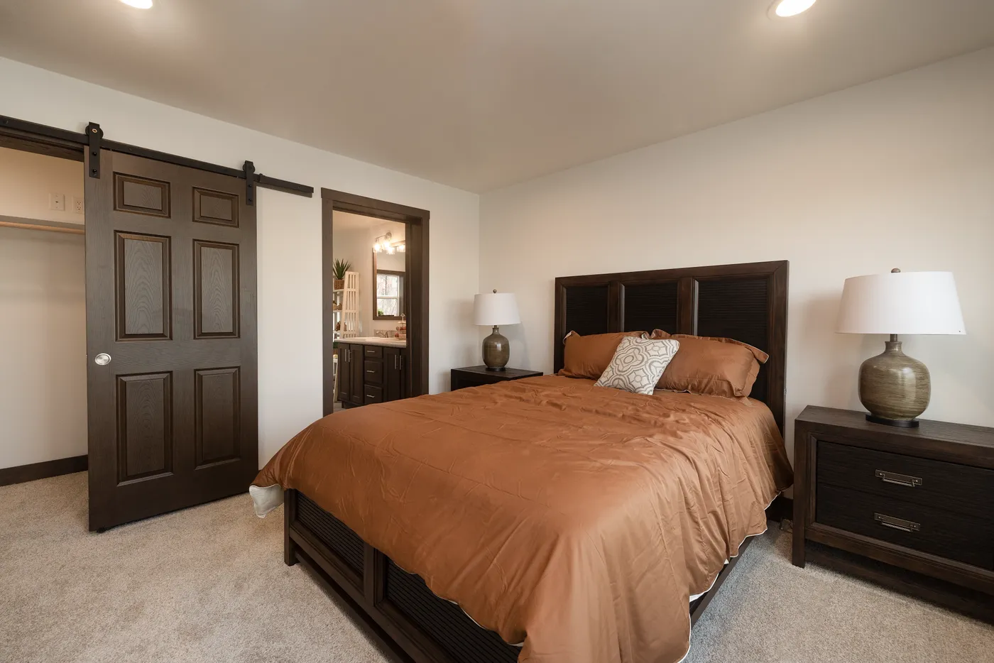 The LEGEND 78 Primary Bedroom. This Manufactured Mobile Home features 3 bedrooms and 2 baths.