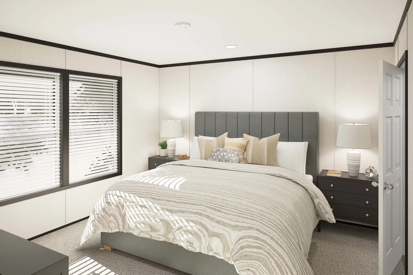 The PLATINUM ANNIVERSARY Primary Bedroom. This Manufactured Mobile Home features 3 bedrooms and 2 baths.