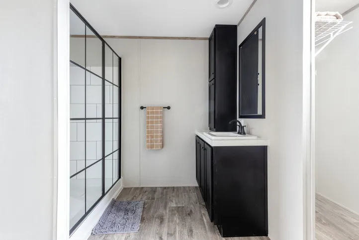 The STERLING XL ANNIVERSARY Primary Bathroom. This Manufactured Mobile Home features 3 bedrooms and 2 baths.