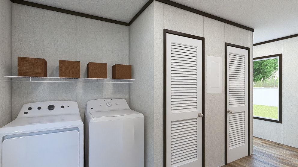The FESTIVAL Utility Room. This Manufactured Mobile Home features 3 bedrooms and 2 baths.