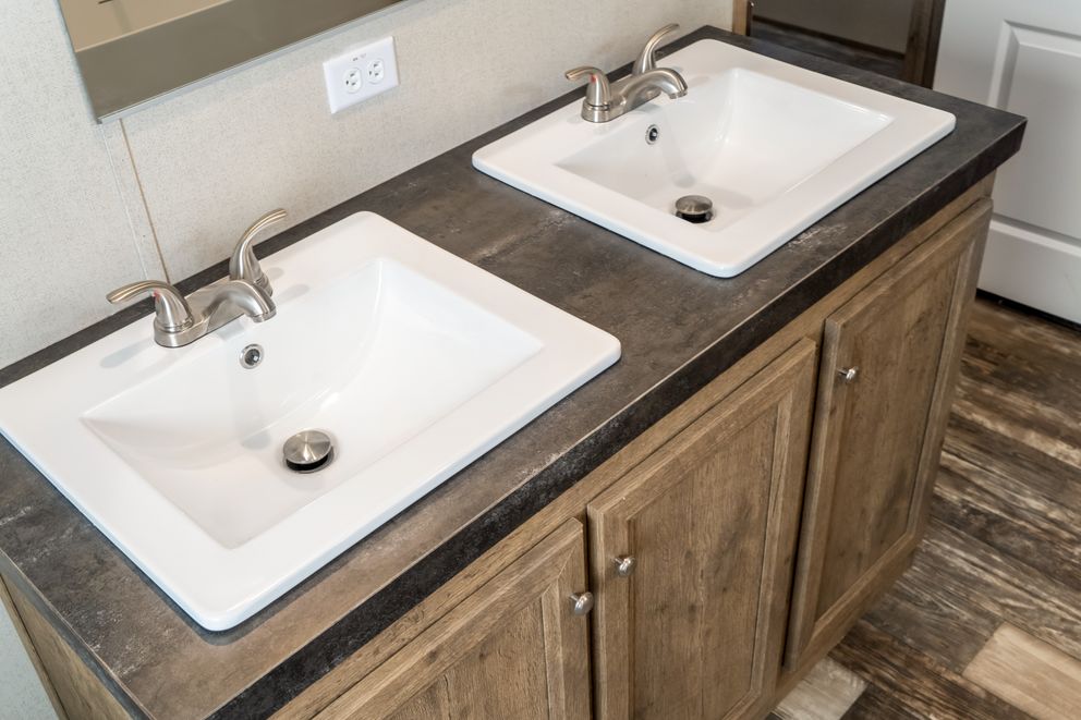 The THE BREEZE Exterior. This Manufactured Mobile Home features 3 bedrooms and 2 baths.