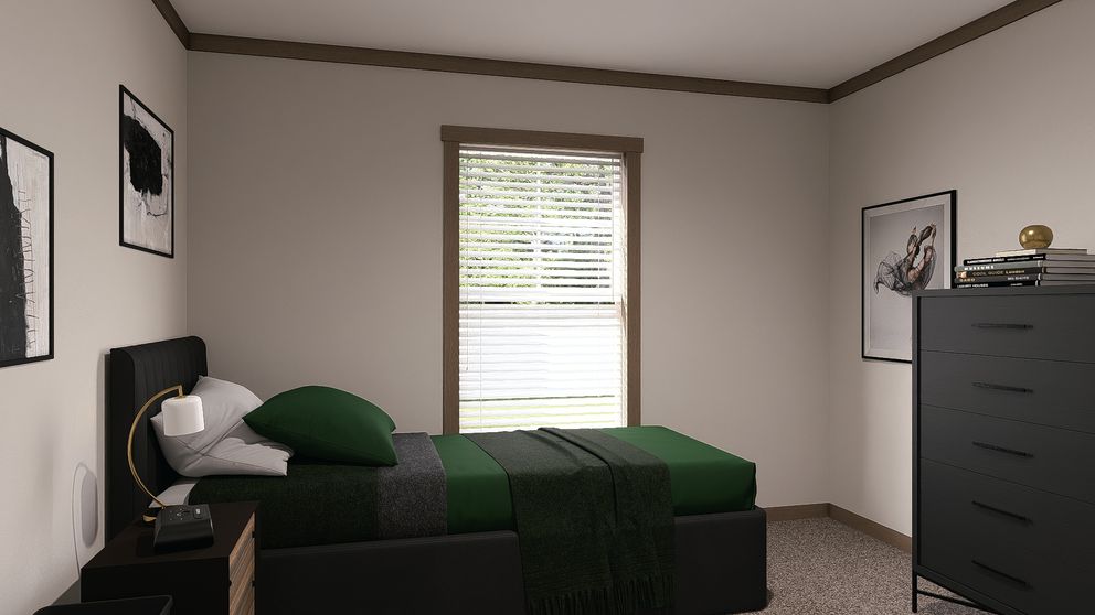 The EVERETT Guest Bedroom. This Manufactured Mobile Home features 4 bedrooms and 3 baths.