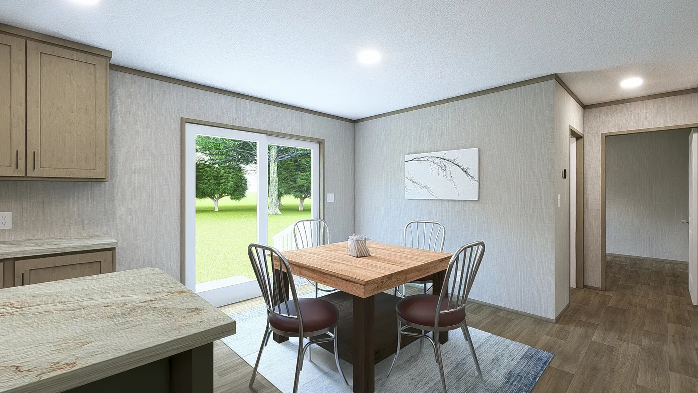 The RIO Dining Area. This Manufactured Mobile Home features 3 bedrooms and 2 baths.