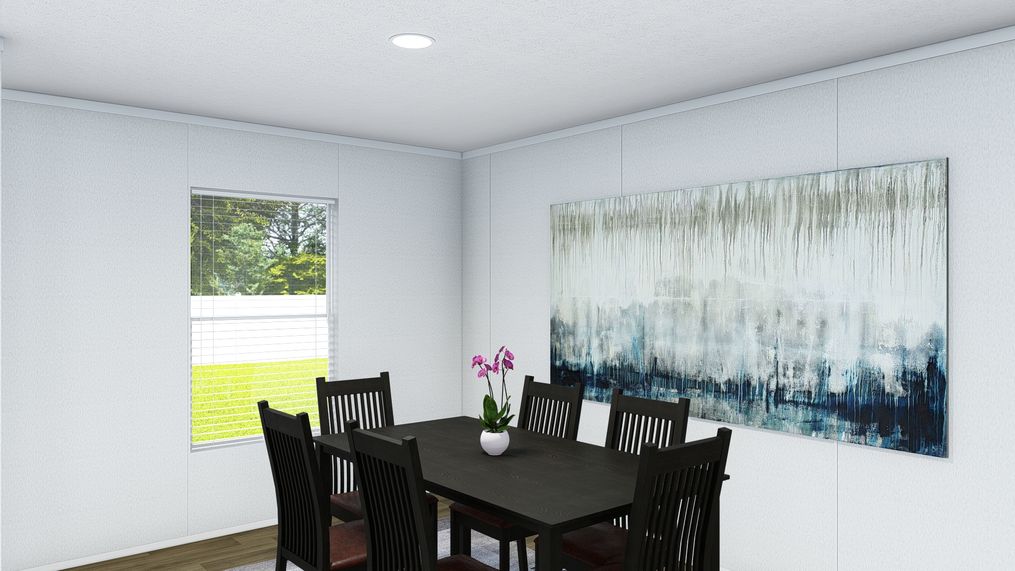 The ISLAND BREEZE 64 Dining Area. This Manufactured Mobile Home features 4 bedrooms and 2 baths.