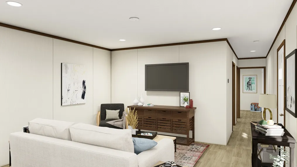 The DESIRE Living Room. This Manufactured Mobile Home features 3 bedrooms and 2 baths.