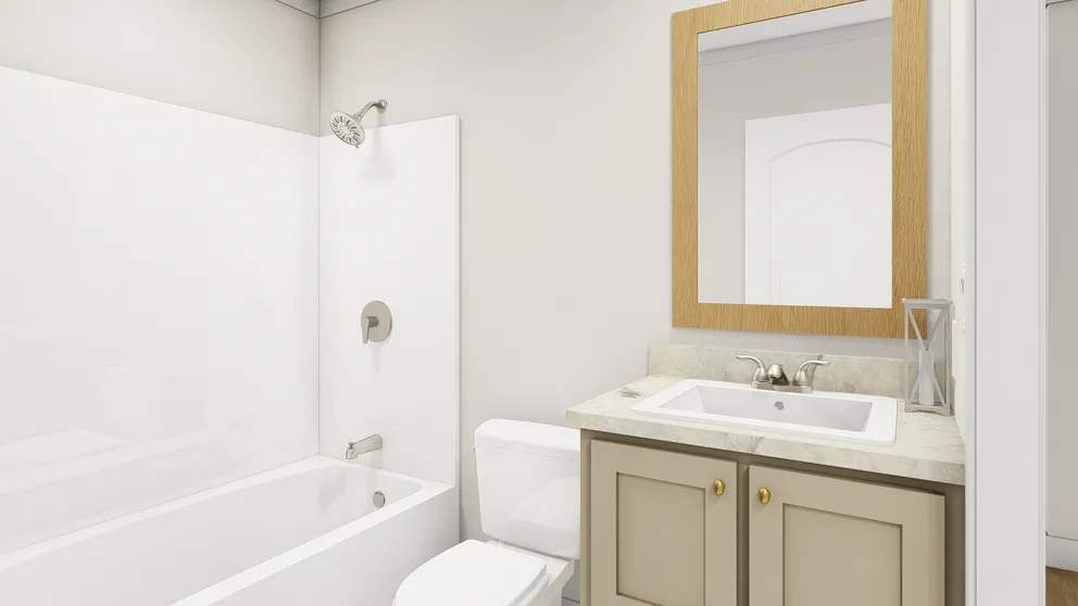 The WALK THE LINE Guest Bathroom. This Manufactured Mobile Home features 3 bedrooms and 2 baths.