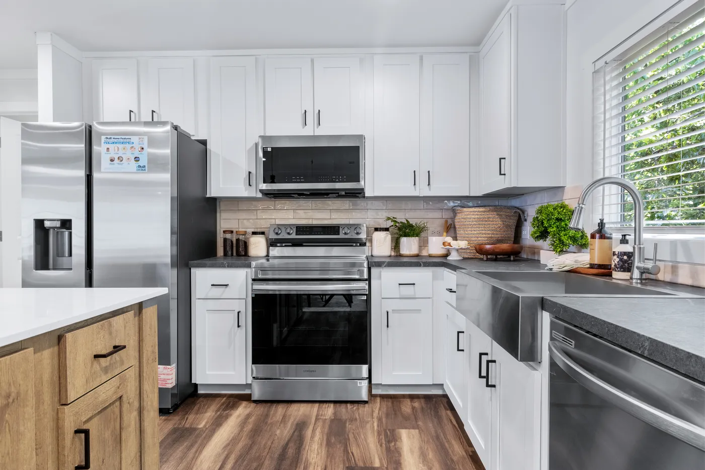 The SAWYER ELITE Kitchen. This Manufactured Mobile Home features 3 bedrooms and 2 baths.