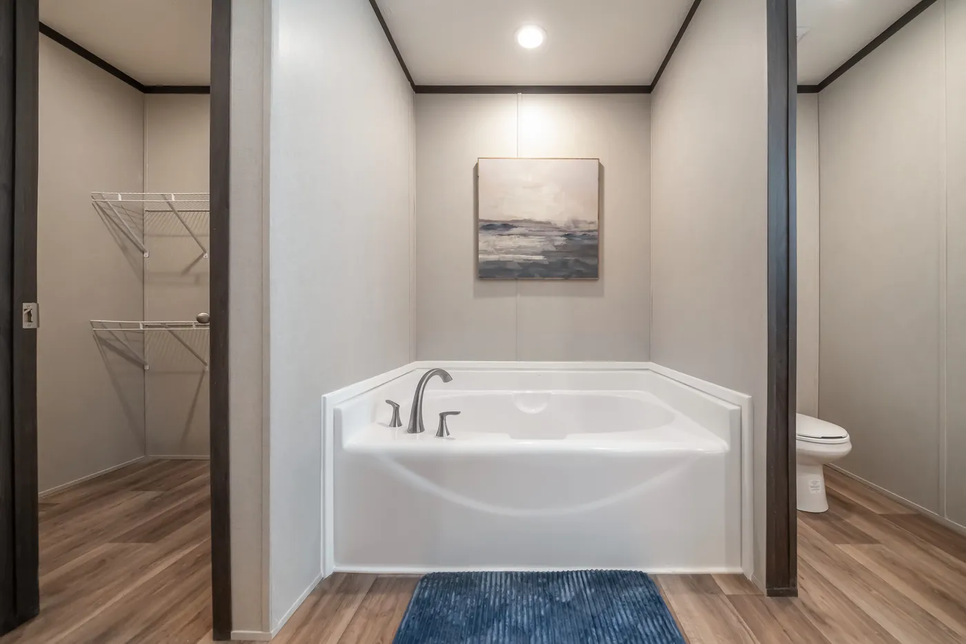 The DYNAMIC Primary Bathroom. This Manufactured Mobile Home features 3 bedrooms and 2 baths.