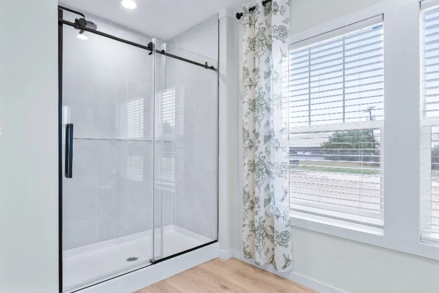 The THE ARCHIBALD Primary Bathroom. This Manufactured Mobile Home features 4 bedrooms and 2 baths.