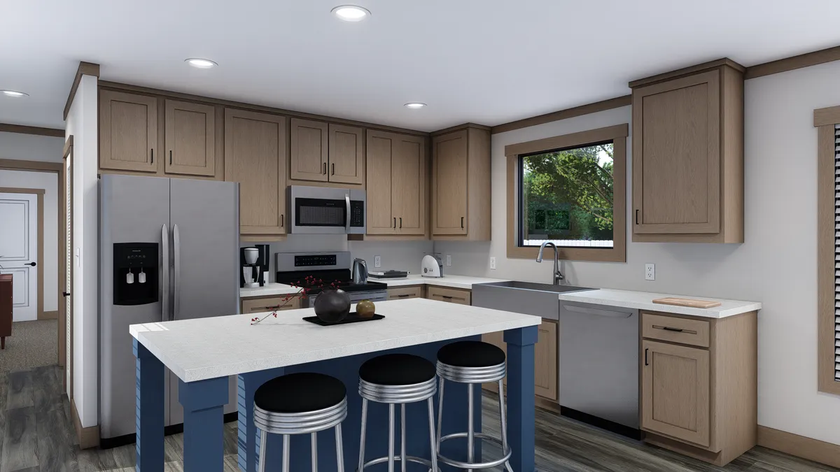 The TRINITY 76 Kitchen. This Manufactured Mobile Home features 3 bedrooms and 2 baths.
