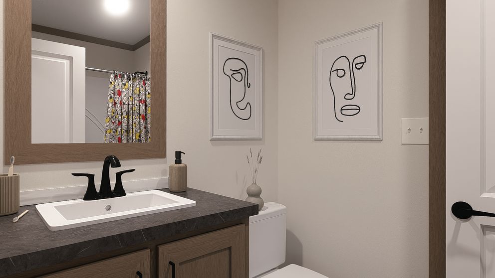 The NELLIE ELITE Guest Bathroom. This Manufactured Mobile Home features 4 bedrooms and 3 baths.