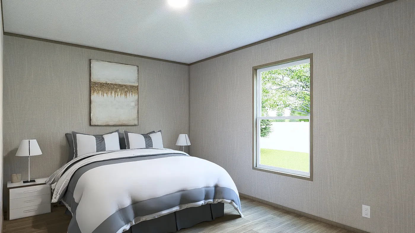 The EVEREST Primary Bedroom. This Manufactured Mobile Home features 4 bedrooms and 2 baths.