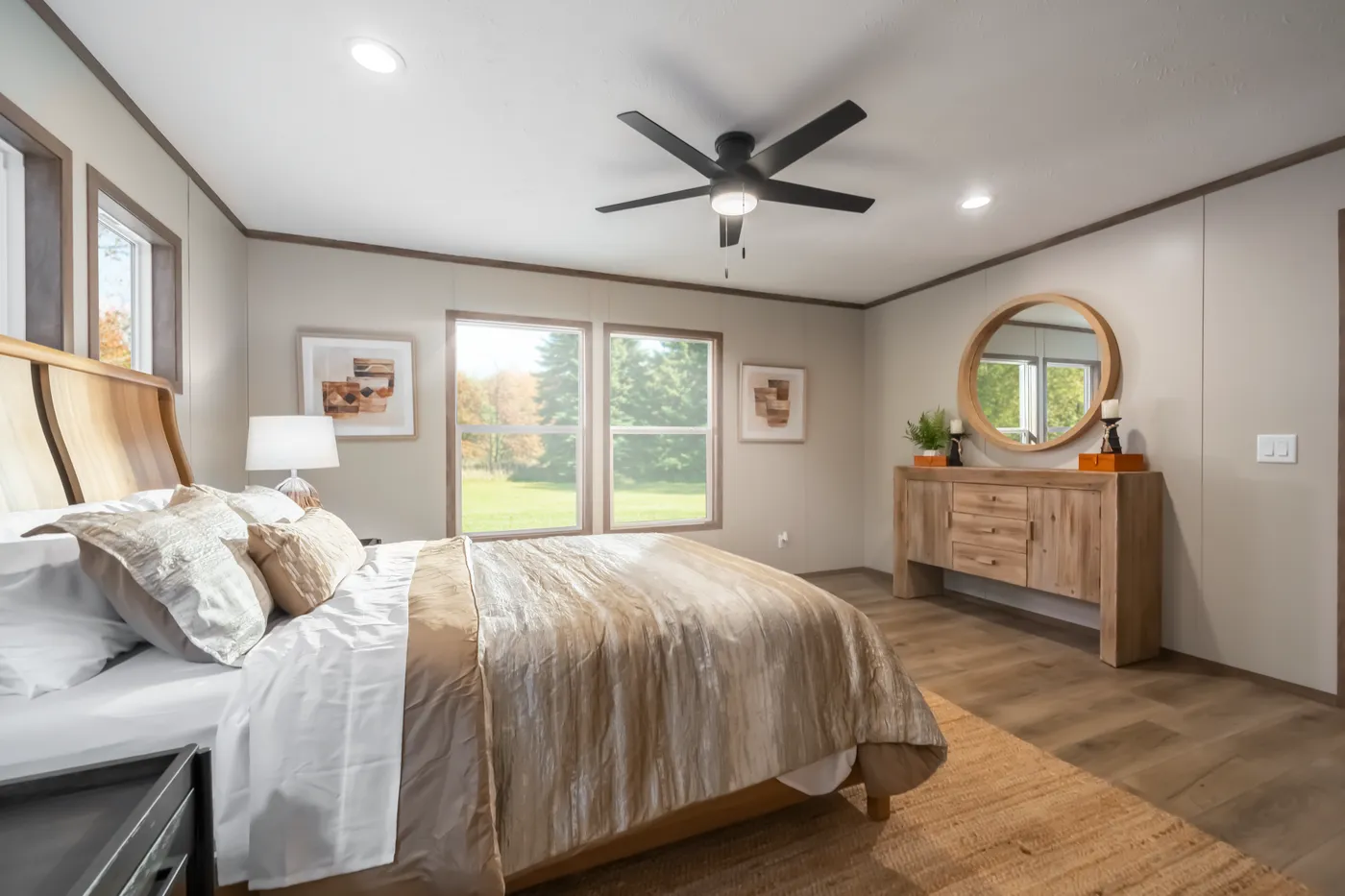 The SEVIER Primary Bedroom. This Manufactured Mobile Home features 4 bedrooms and 3 baths.