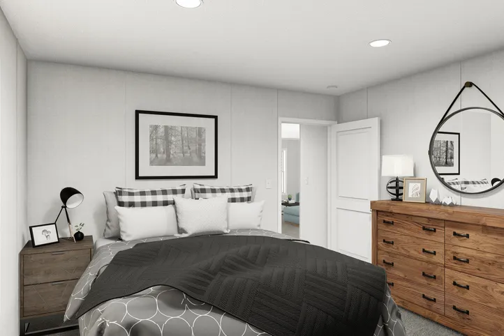 The JADE Primary Bedroom. This Manufactured Mobile Home features 2 bedrooms and 1 bath.