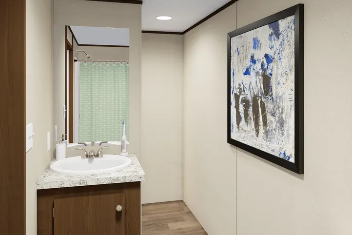 The DELIGHT Primary Bathroom. This Manufactured Mobile Home features 2 bedrooms and 2 baths.