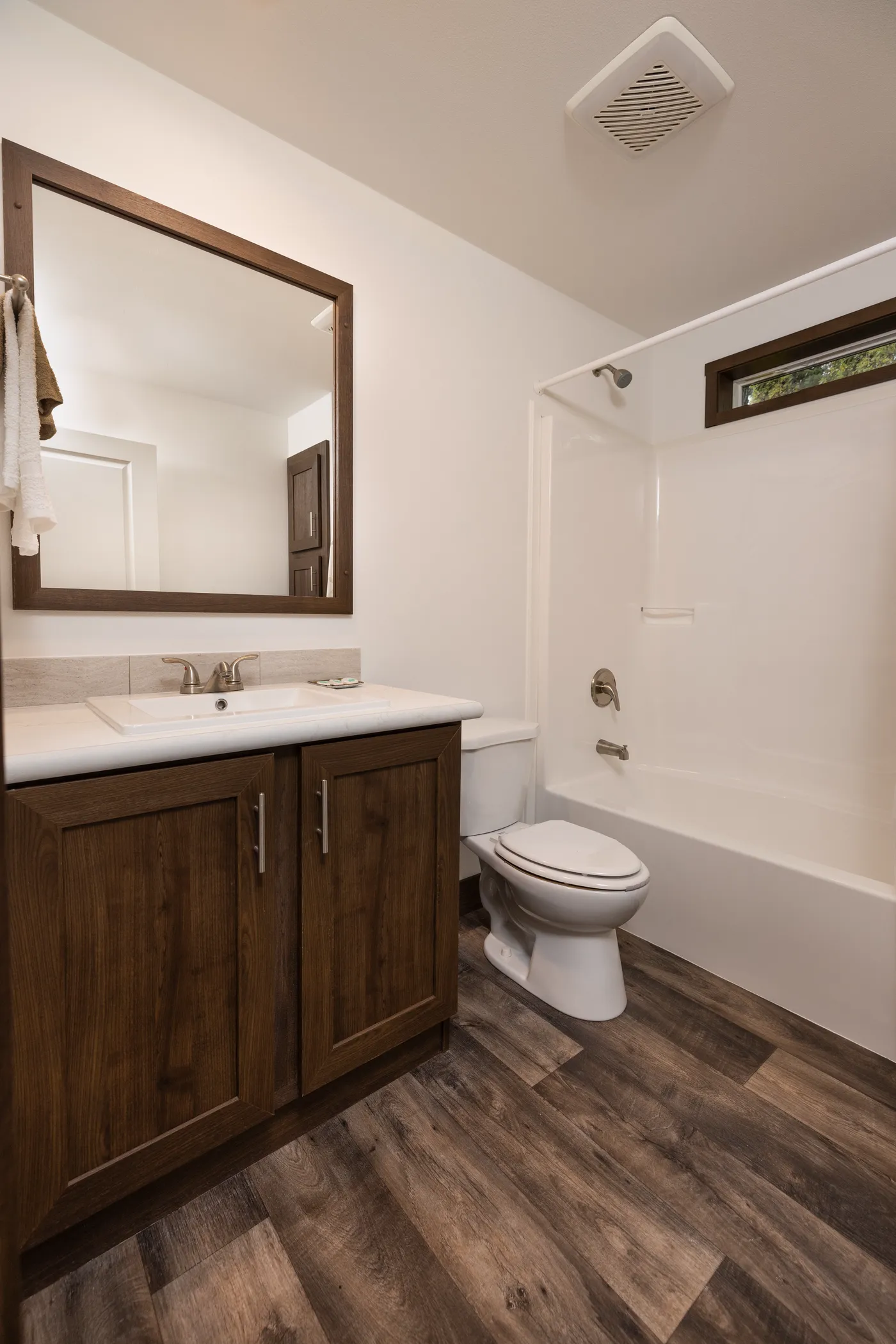 The RAMSEY 75 Guest Bathroom. This Manufactured Mobile Home features 4 bedrooms and 2 baths.