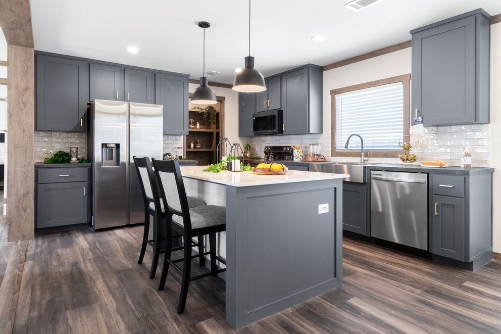The FARM 4 FLEX Kitchen. This Manufactured Mobile Home features 4 bedrooms and 3 baths.
