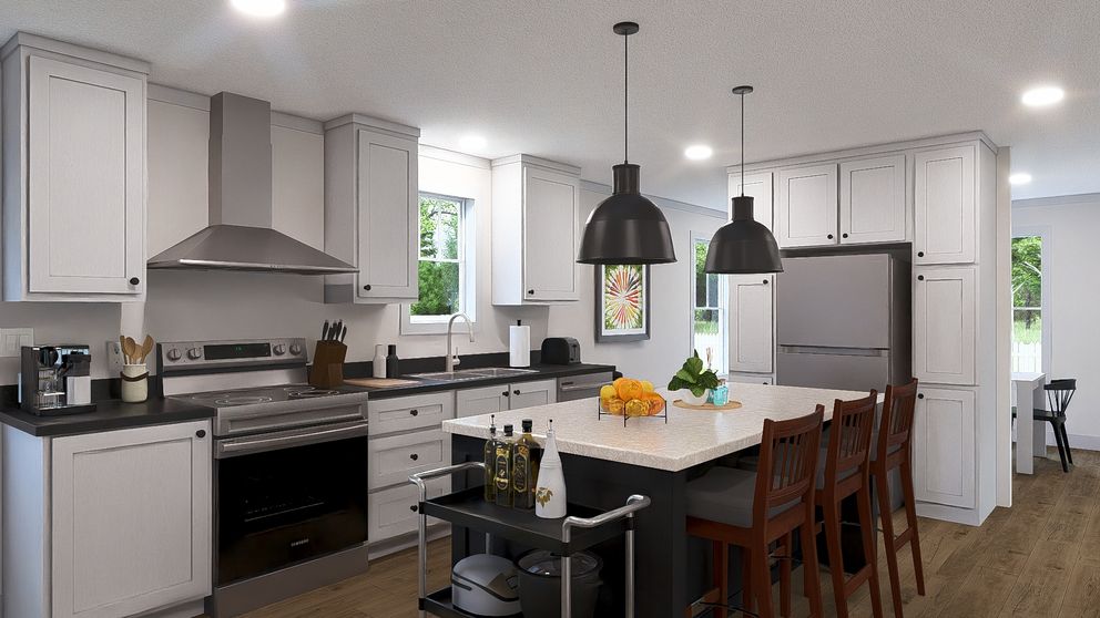 The STAYIN' ALIVE Kitchen. This Manufactured Mobile Home features 3 bedrooms and 2 baths.