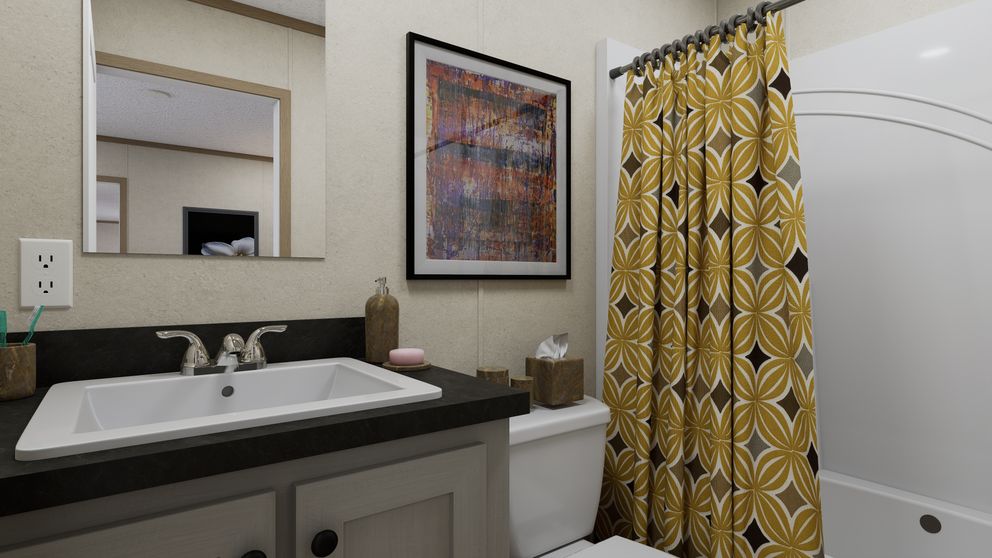 The 6014-CC02 CLEARPATH 60 Primary Bathroom. This Manufactured Mobile Home features 2 bedrooms and 2 baths.