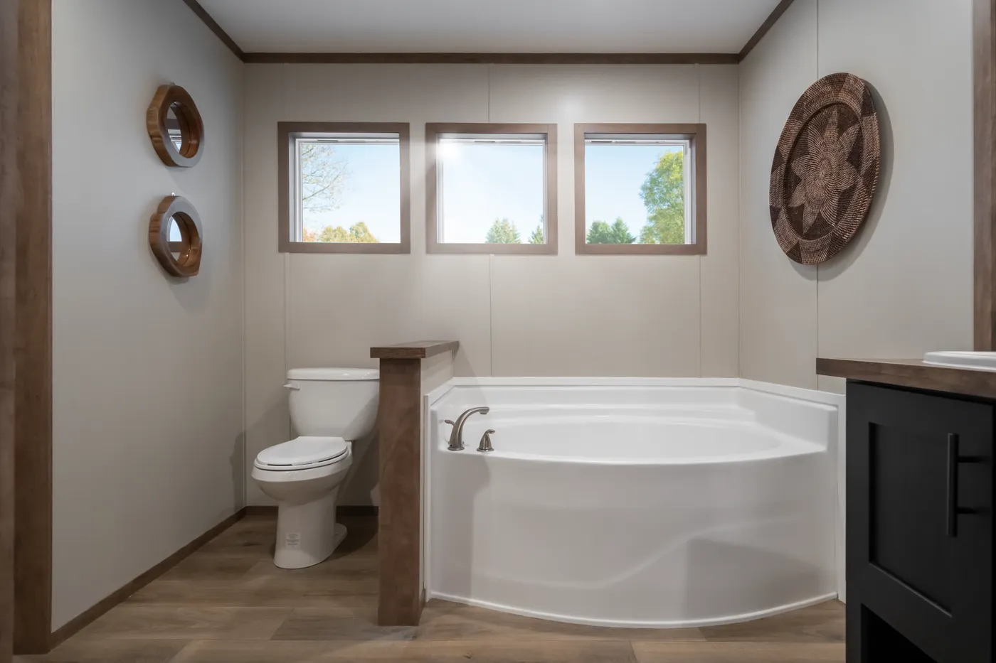 The SEVIER Primary Bathroom. This Manufactured Mobile Home features 4 bedrooms and 3 baths.