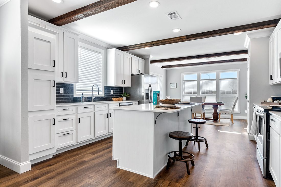 The THE VAIL Kitchen. This Manufactured Mobile Home features 3 bedrooms and 2 baths.