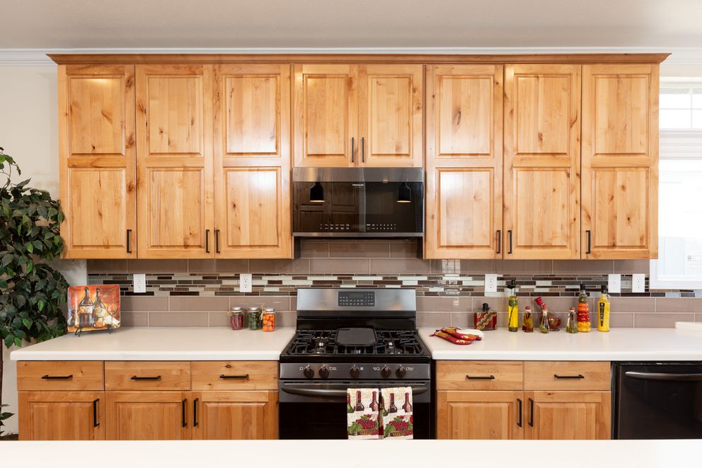 The SUM3076A Kitchen. This Manufactured Mobile Home features 4 bedrooms and 2.5 baths.