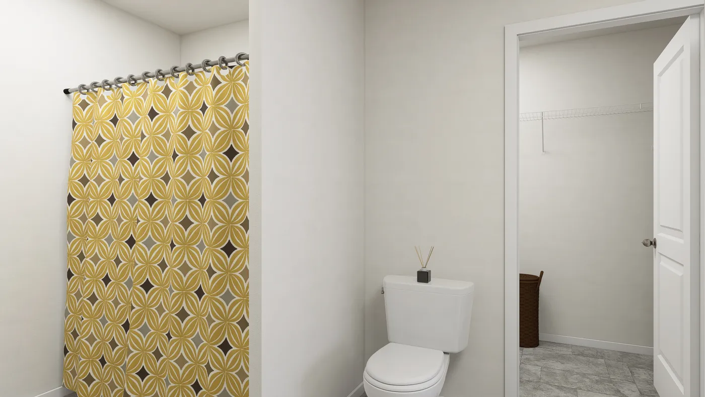 The SLE 561F Primary Bathroom. This Manufactured Mobile Home features 3 bedrooms and 2 baths.