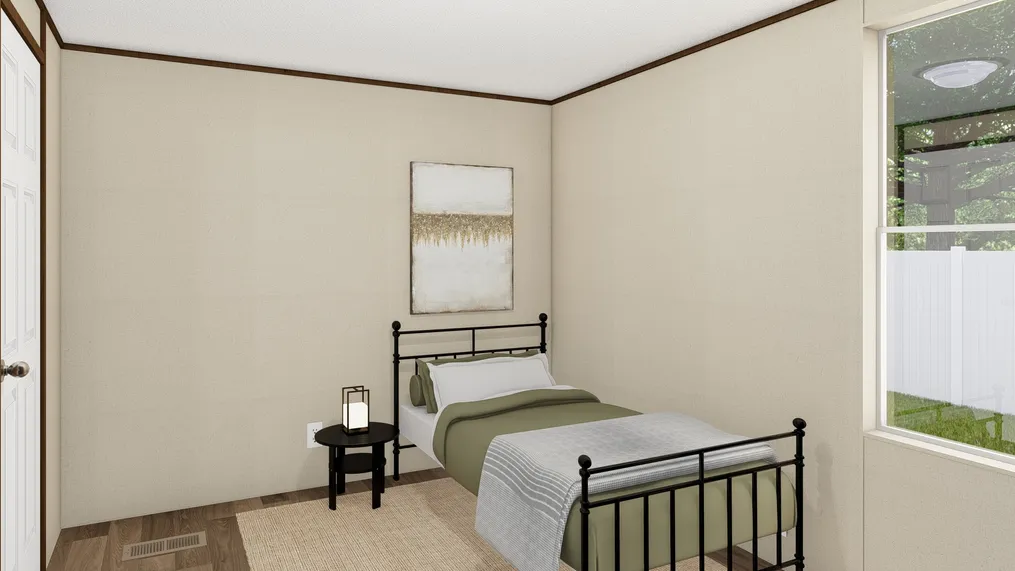 The SPECTACULAR Guest Bedroom. This Manufactured Mobile Home features 3 bedrooms and 2 baths.