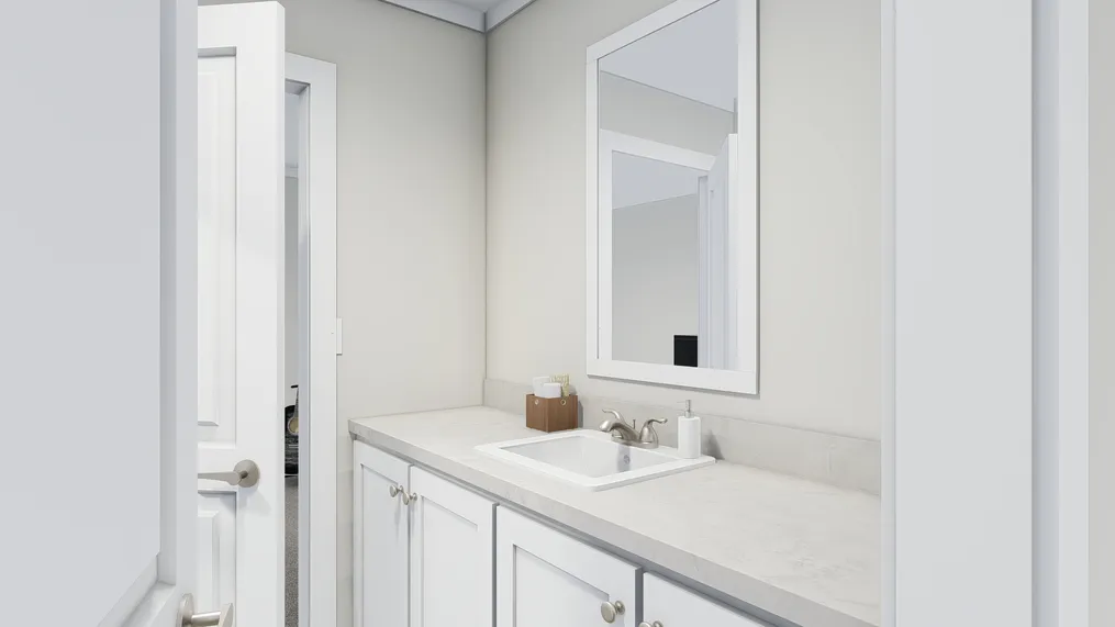 The COUNTRY AIRE Guest Bathroom. This Manufactured Mobile Home features 3 bedrooms and 3 baths.