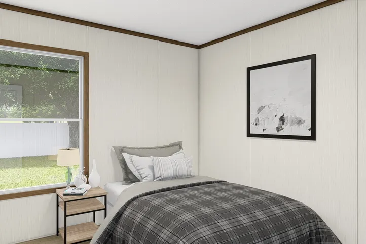 The BALANCE Guest Bedroom. This Manufactured Mobile Home features 3 bedrooms and 2 baths.