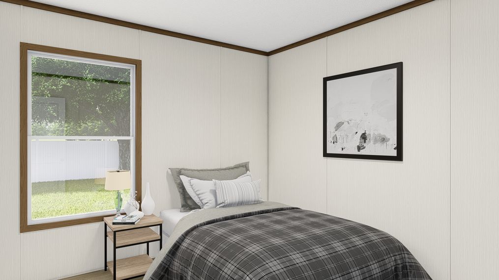 The BALANCE Guest Bedroom. This Manufactured Mobile Home features 3 bedrooms and 2 baths.