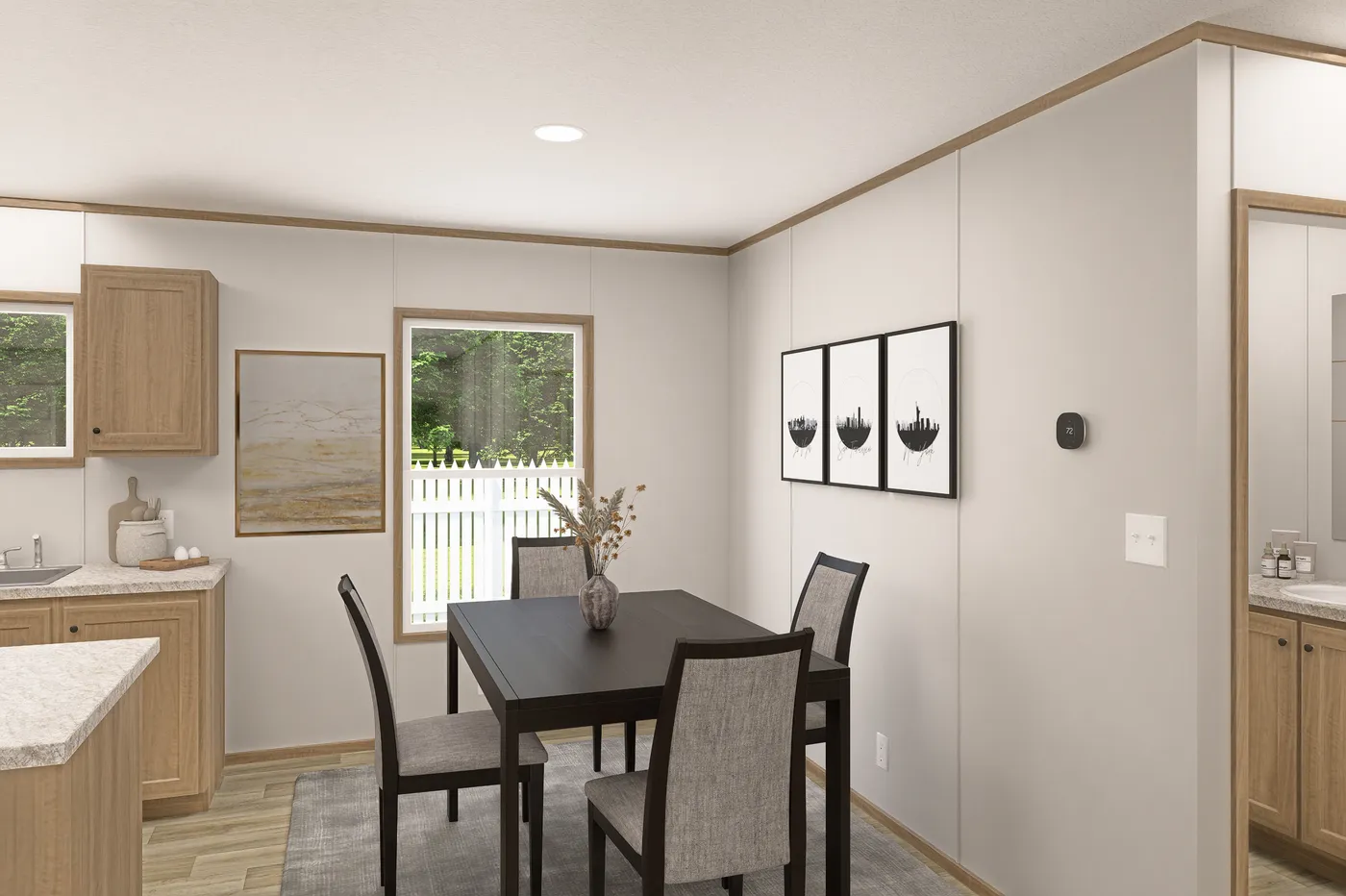 The THE EAGLE 52 Dining Room. This Manufactured Mobile Home features 3 bedrooms and 2 baths.