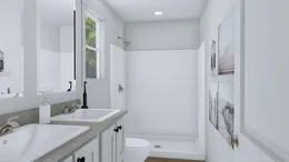 The CMH TEM2456-3A PURPLE RAIN Guest Bathroom. This Manufactured Mobile Home features 3 bedrooms and 2 baths.