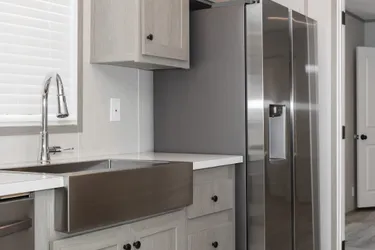 The THE ANNIVERSARY 76 Kitchen. This Manufactured Mobile Home features 3 bedrooms and 2 baths.