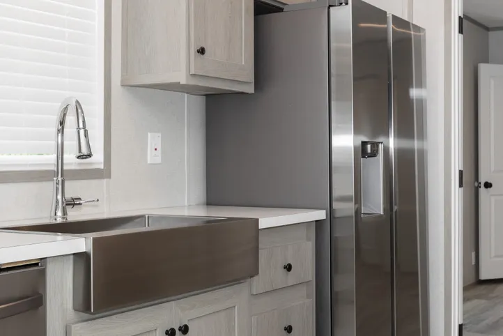 The THE ANNIVERSARY 76 Kitchen. This Manufactured Mobile Home features 3 bedrooms and 2 baths.