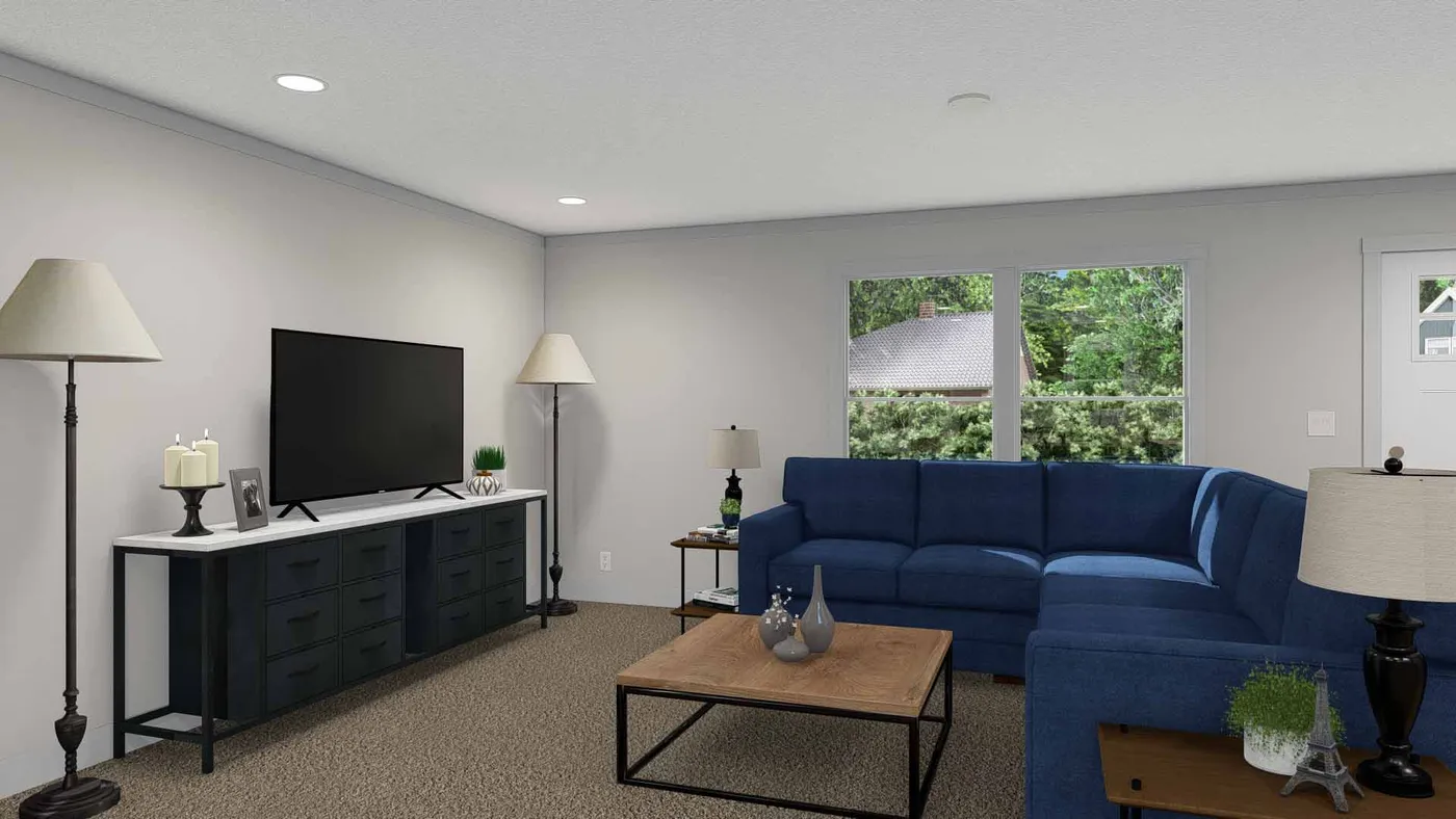 The ROCKET MAN Living Room. This Manufactured Mobile Home features 3 bedrooms and 2 baths.