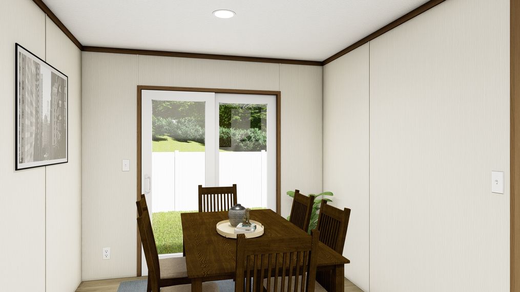 The THE GRAND Dining Room. This Manufactured Mobile Home features 3 bedrooms and 2 baths.