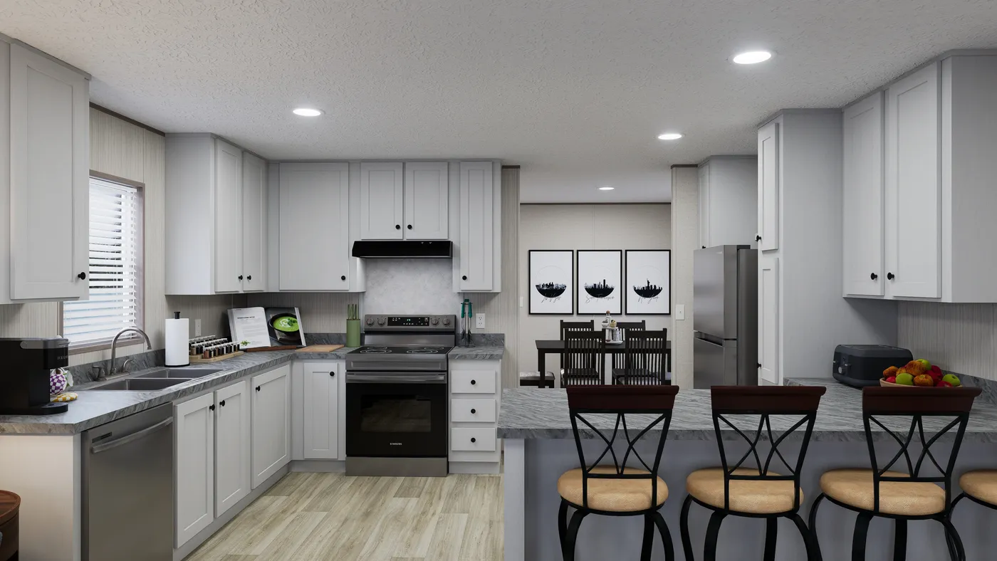 The ROCKY VALLEY Kitchen. This Manufactured Mobile Home features 3 bedrooms and 2 baths.