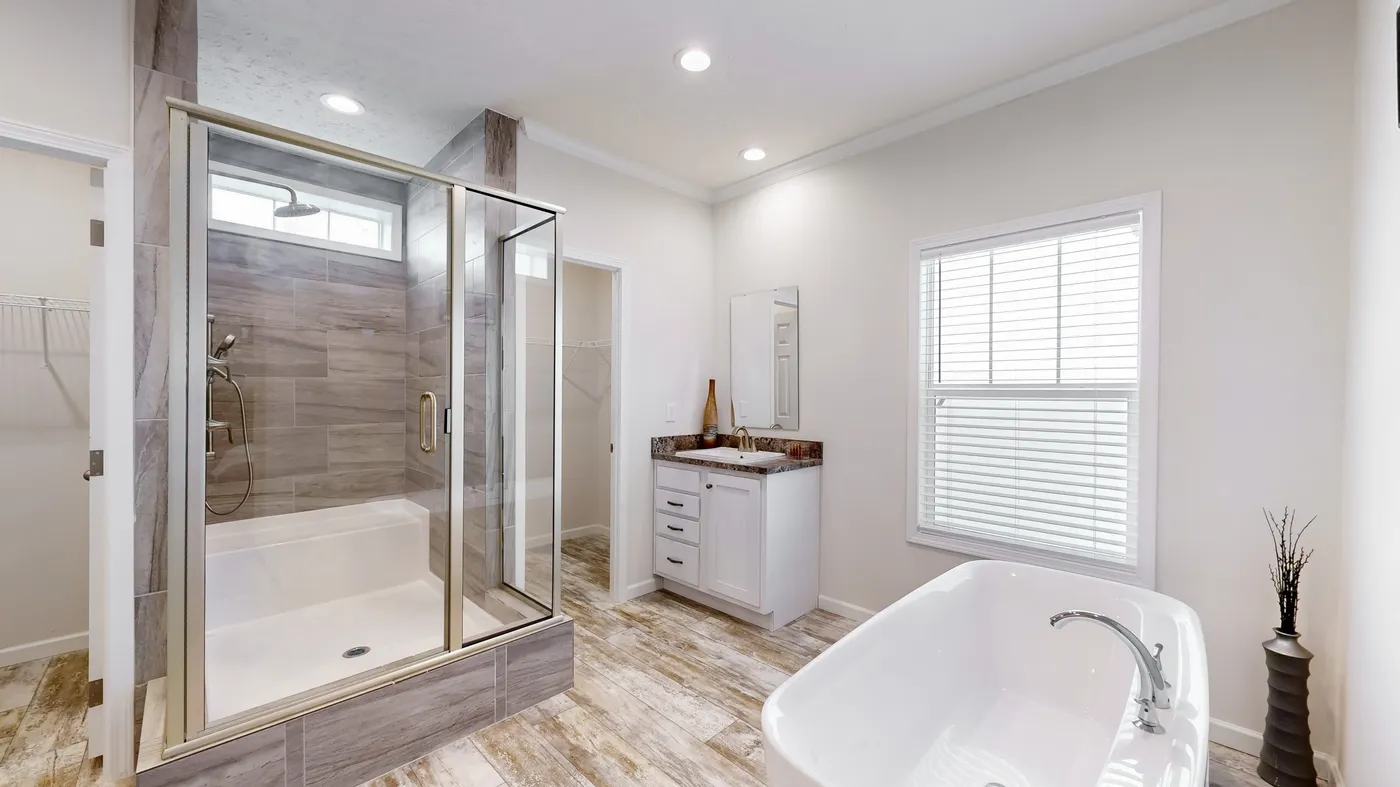 The 4872 ENTERPRISE 32X76 MODULAR Primary Bathroom. This Modular Home features 4 bedrooms and 2 baths.