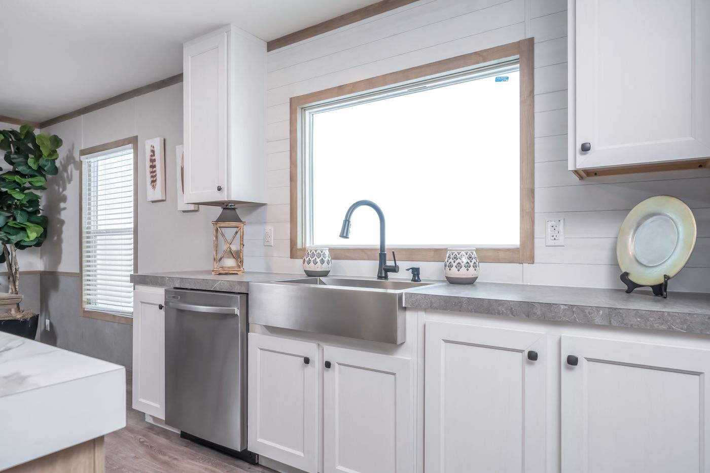 The PT 78 Kitchen. This Manufactured Mobile Home features 3 bedrooms and 2 baths.